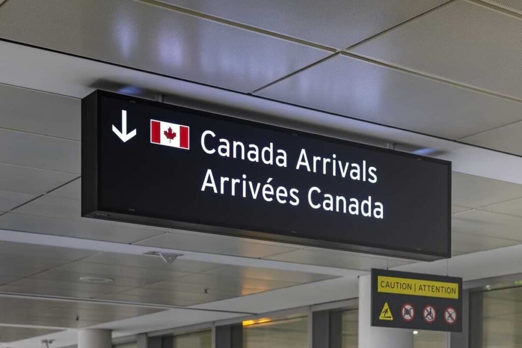 A picture of an arrivals to Canada sign at Pearson International Airport